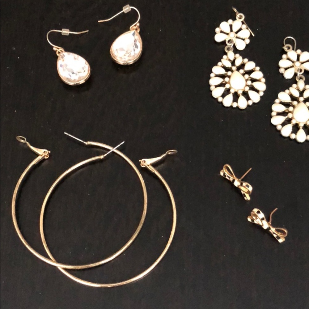 Four pairs of gold earrings